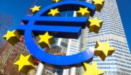 Euro holds ground as traders await Draghi