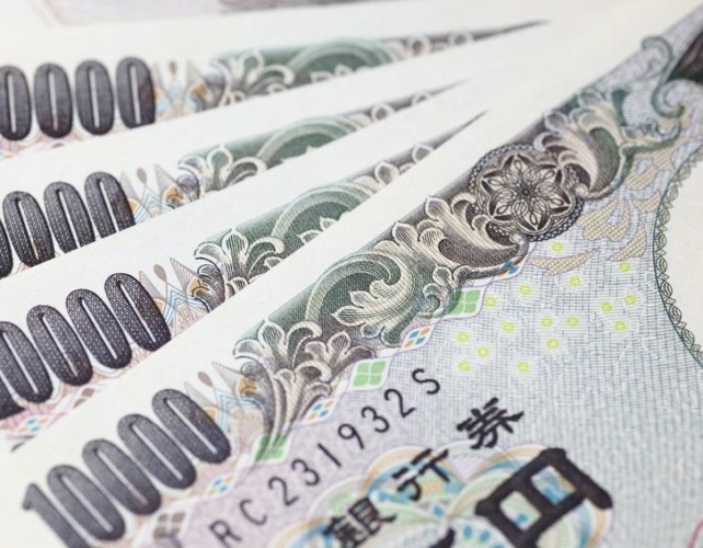 Dollar soars above 114 versus yen as Abe records convincing election win