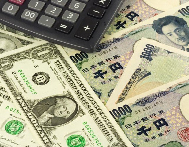 Dollar nudges higher versus yen ahead of BOJ