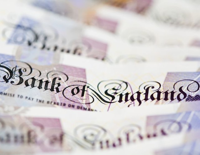 Pound slips as rate hike hopes ease